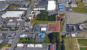Two low-rise office buildings for sale in Burlington, WA.