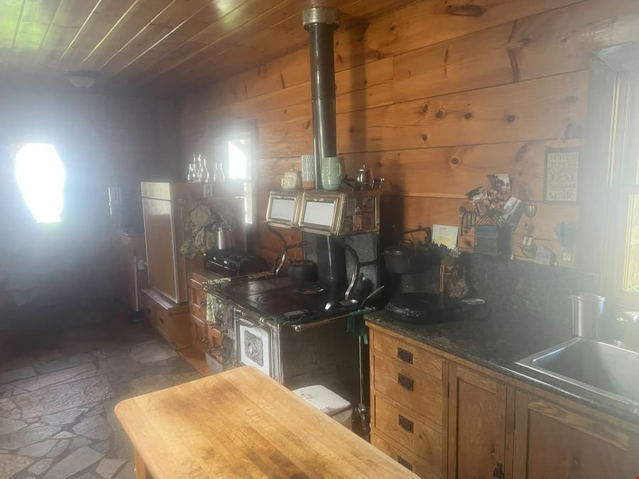 Logs, Cabins & Land