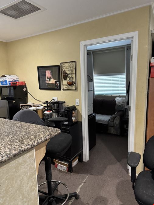 Office with detached shop and gated yard