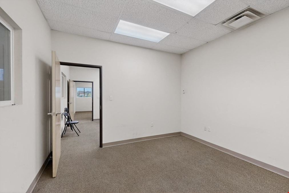 RARE WAREHOUSE WITH GATED & PAVED YARD