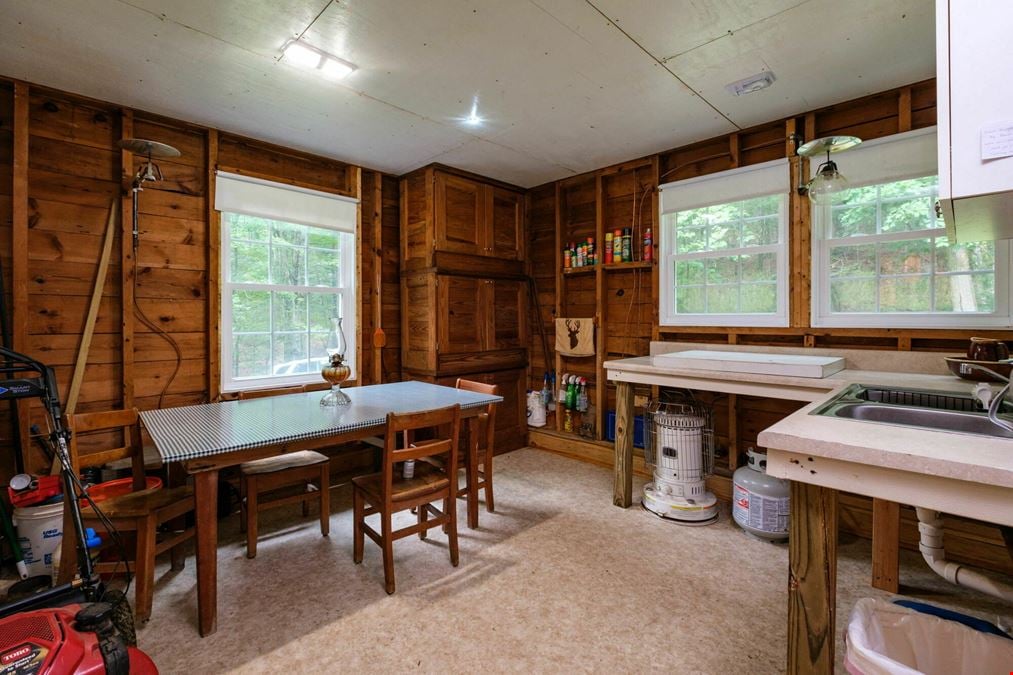 ADJOINING NATIONAL FOREST - 54.5 ACRE OFF-GRID MOUNTAIN RETREAT W/ CABIN