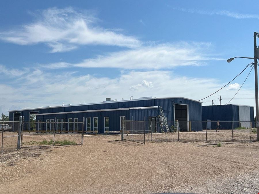 INDUSTRIAL WITH FENCED YARD STROTHER FIELD