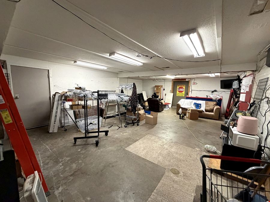 Retail Property with Open Showroom Near Hy-Vee For Sale
