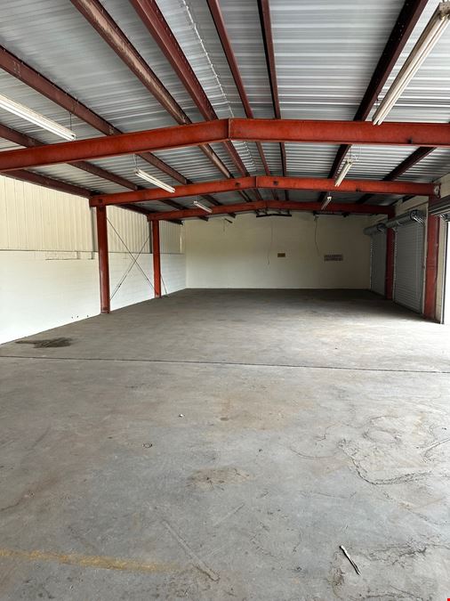 6.68 acres of Industrial Outdoor Storage (IOS) w/ Warehouse