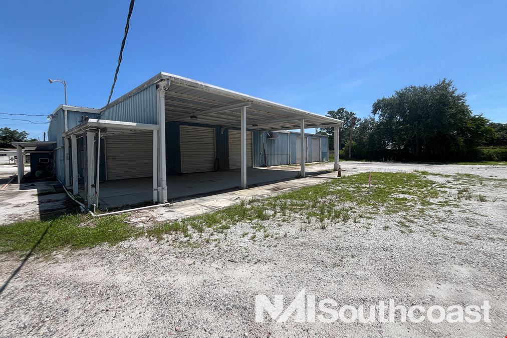 ±7.63 Acres Industrial Land With Metal Warehouse & Office