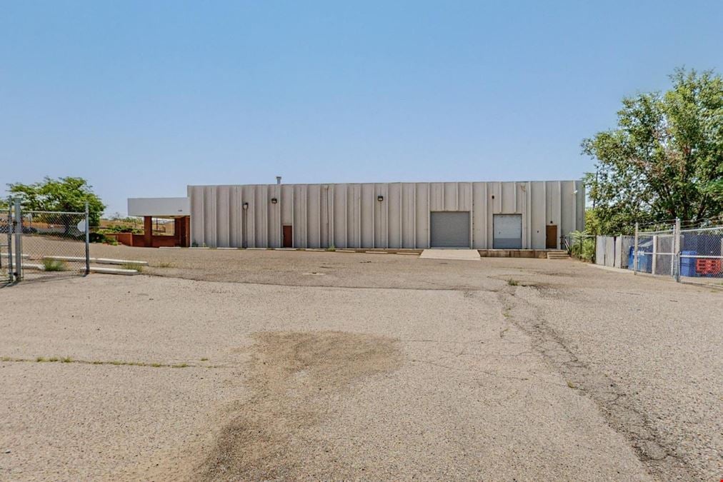 Warehouse Concrete Tilt Up With Gated & Paved Yard with Drive in Door