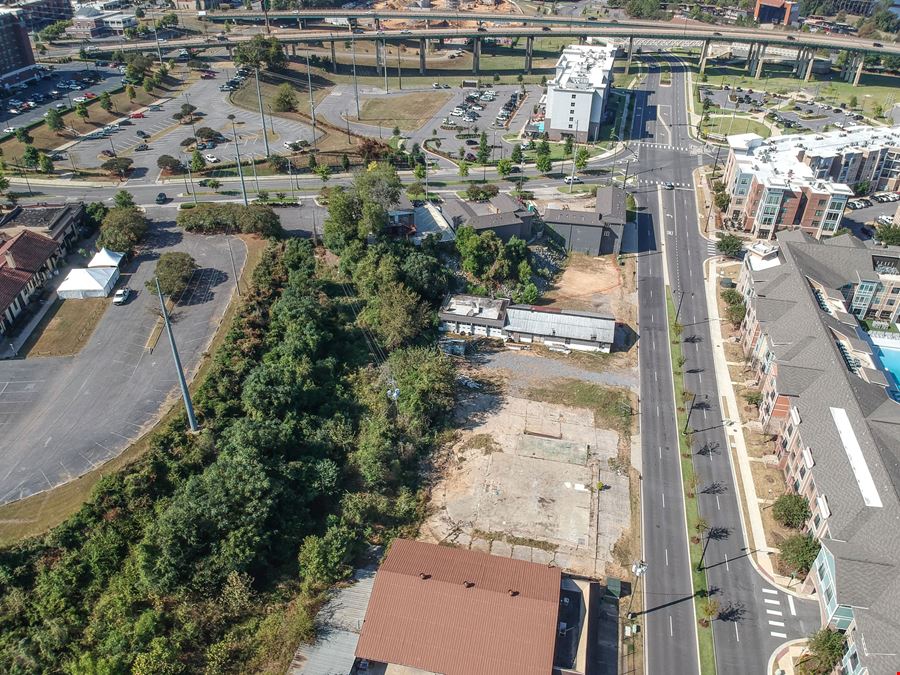 Prime Riverfront District Land + Building