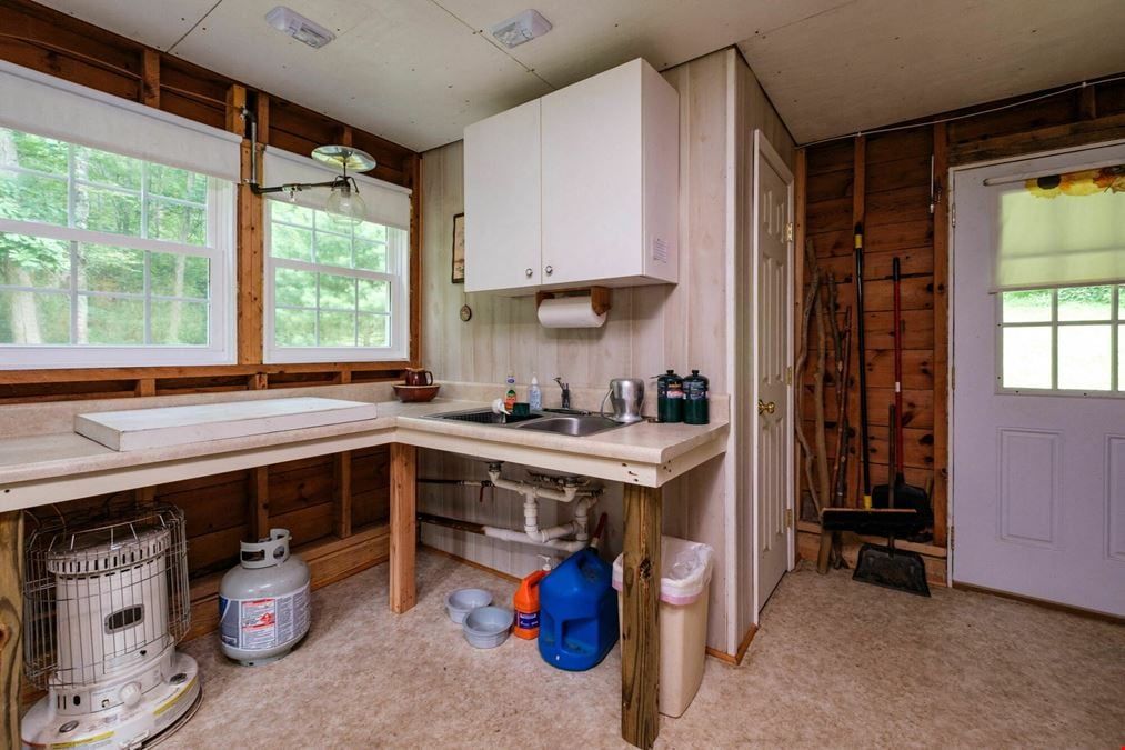 ADJOINING NATIONAL FOREST - 54.5 ACRE OFF-GRID MOUNTAIN RETREAT W/ CABIN