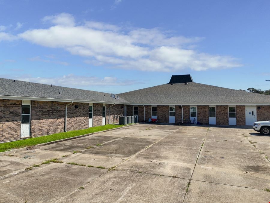Office Complex on ±3.14 Acres Fully Leased to the State