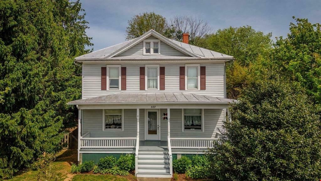 UPDATED RESIDENCE & 30X40 SHOP | ZONED BUSINESS ON 1.3 ACRES