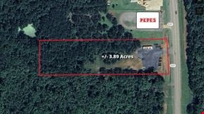 +/- 3.89 Acres Partially Stabilized Land with Office