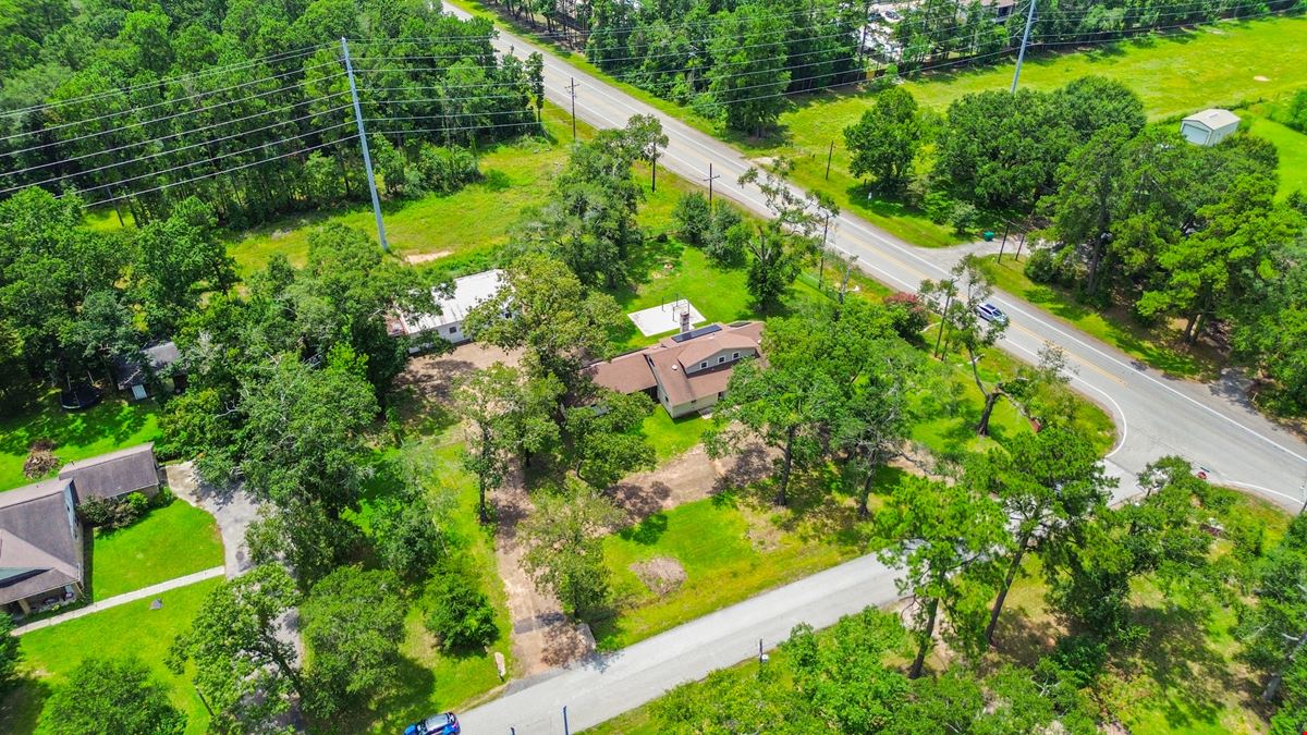 Unrestricted Versatile 1-Acre Commercial Property in Conroe –  Industrial Storage Shed & Carport & home
