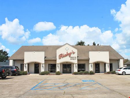 Preview of Retail space for Sale at 11831 Coursey Blvd