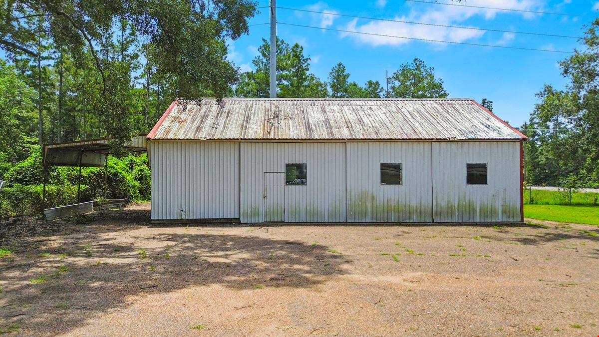 Unrestricted Versatile 1-Acre Commercial Property in Conroe –  Industrial Storage Shed & Carport & home