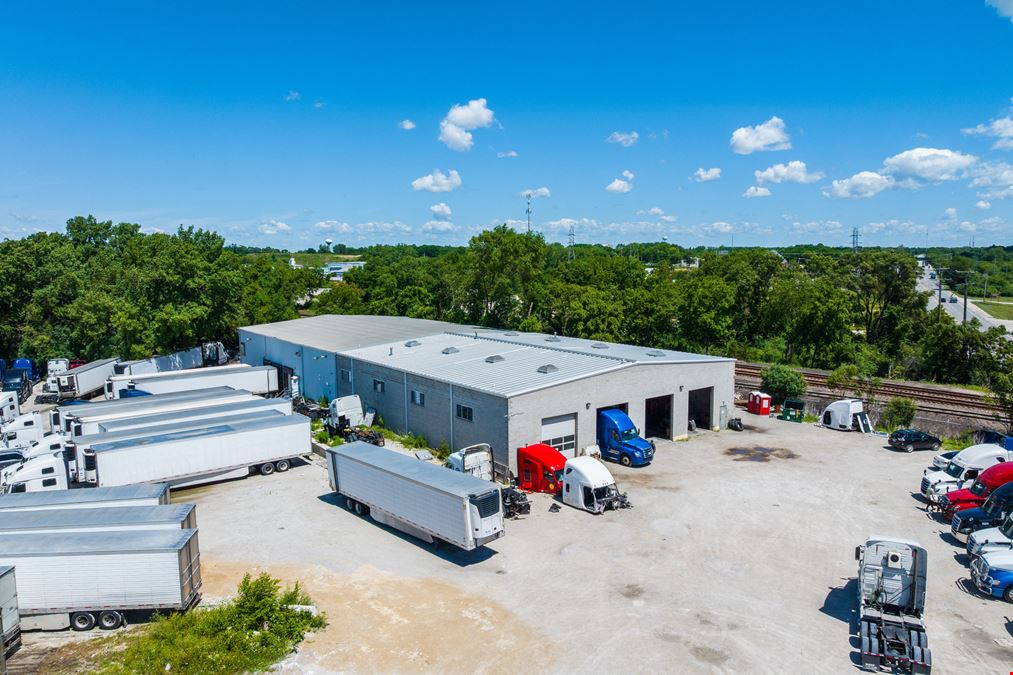 Industrial Facility with Office Space & Fleet Storage & 11.8± AC Dev. Site