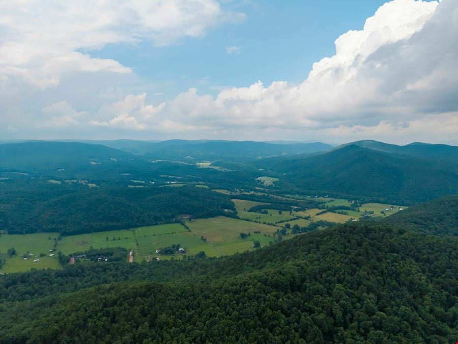 ADJOINING NATIONAL FOREST - 54.5 ACRE OFF-GRID MOUNTAIN RETREAT W/ CABIN