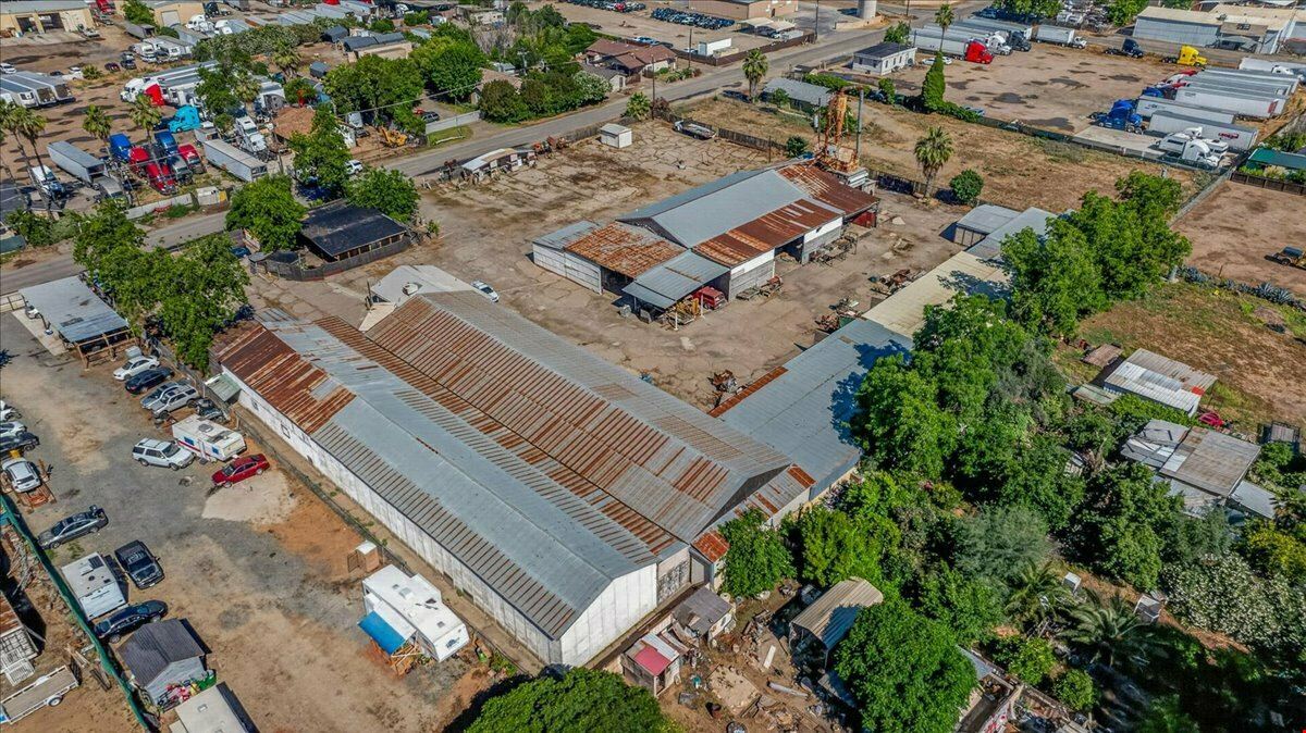 Open Industrial Buildings on 2.14 AC Fenced Land
