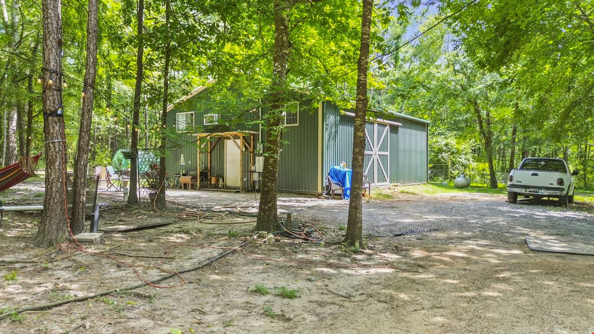 Prime Interstate-Frontage Commercial Tract – ±8.8 Acres with 3 Income Producing Building