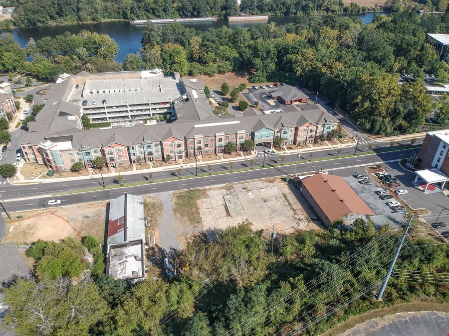 Prime Riverfront District Land + Building