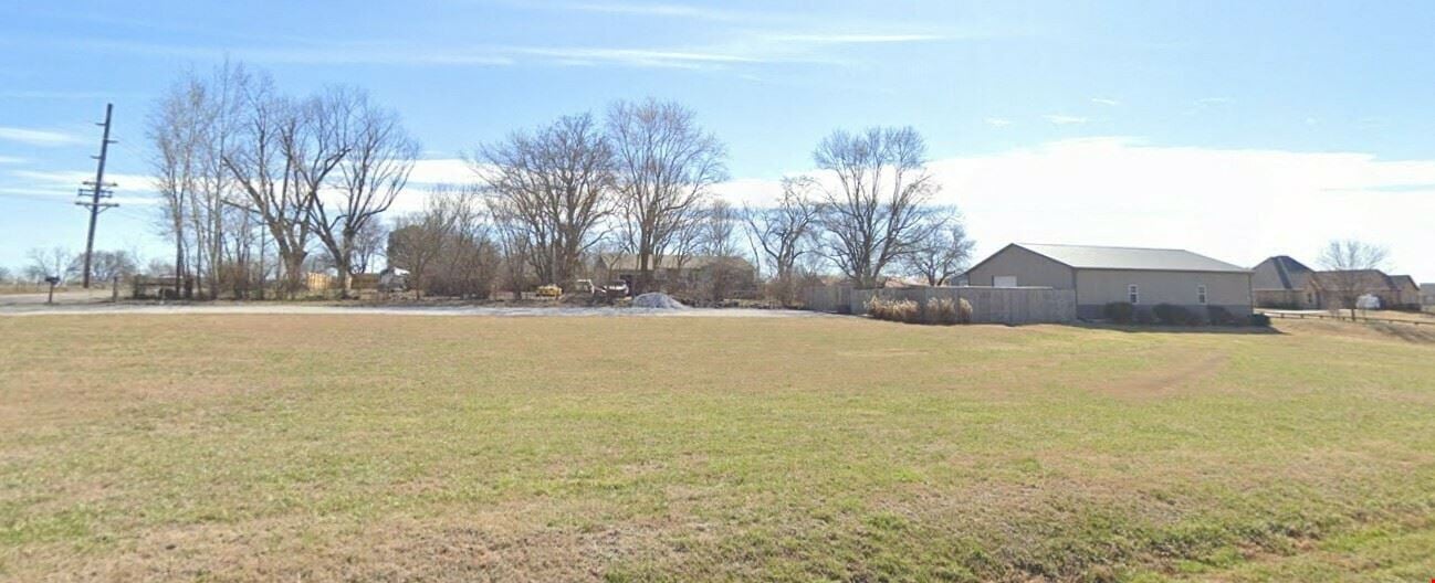 1.97 ACRES IN LOWELL, AR WITH SHOP AND HOME