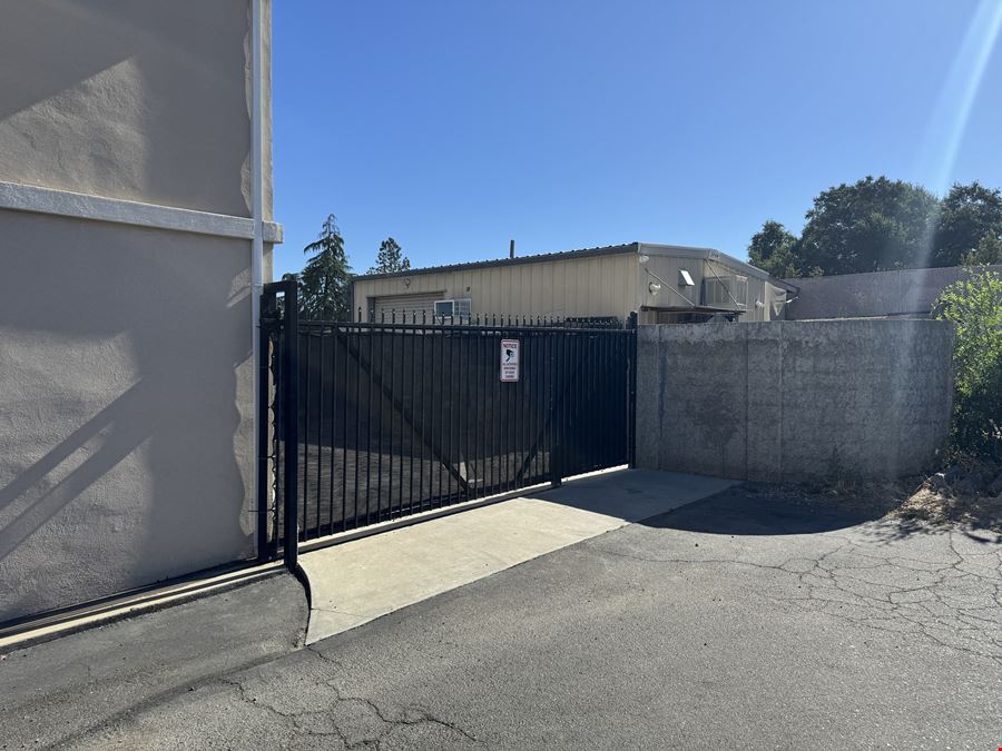 Office with detached shop and gated yard