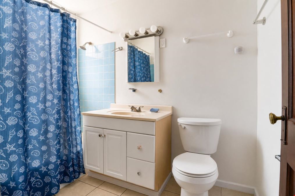 1528 E 74TH PL | 6 Unit Multifamily
