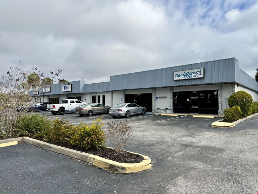 Multi-Tenant Retail Building & Commercial Land