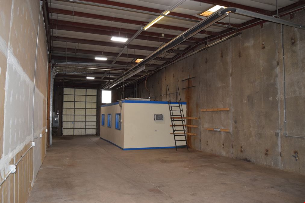 2,000 SF warehouse with dock high loading (drive in access potential)