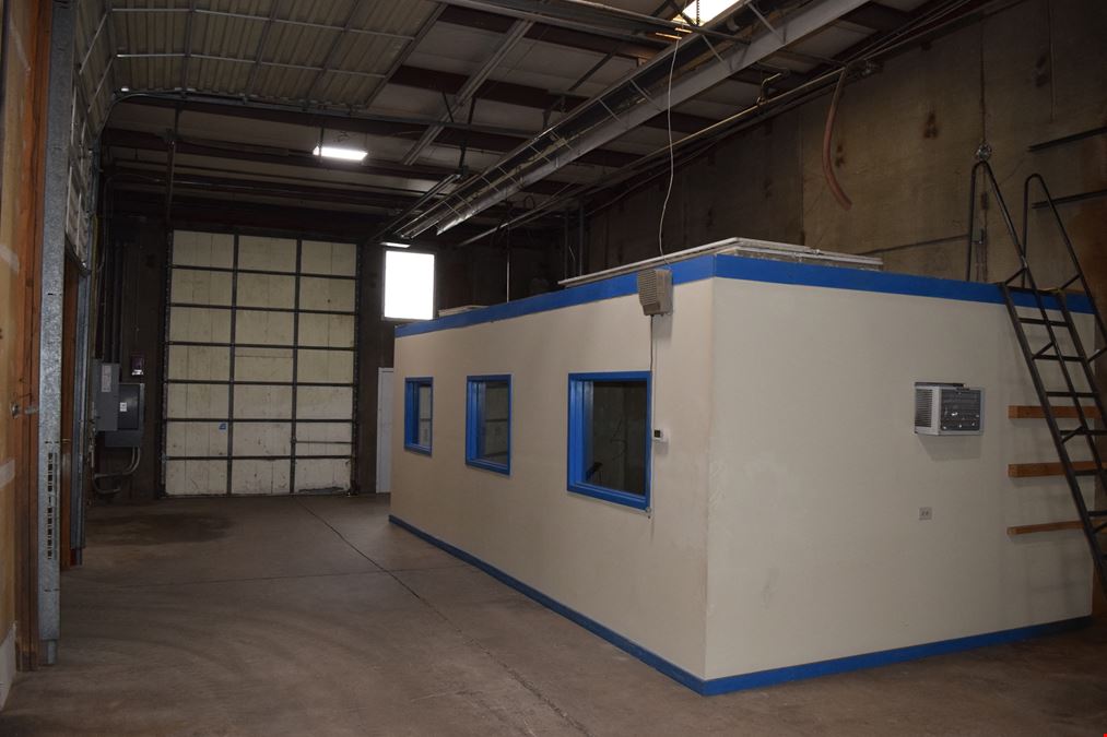 2,000 SF warehouse with dock high loading (drive in access potential)
