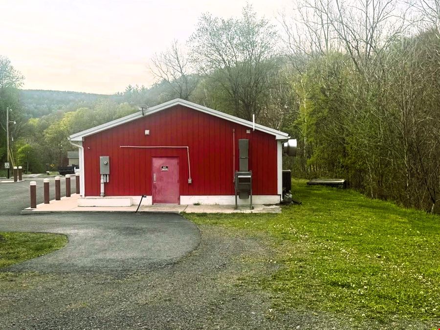 Mixed-Use Opportunity: Rented Storage Units + Large Main Building