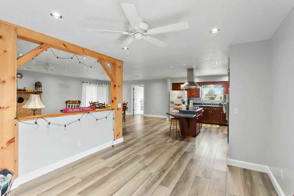 COUNTRY LIVING MEETS BUSINESS OPPORRUNITY ON 5+ ACRES