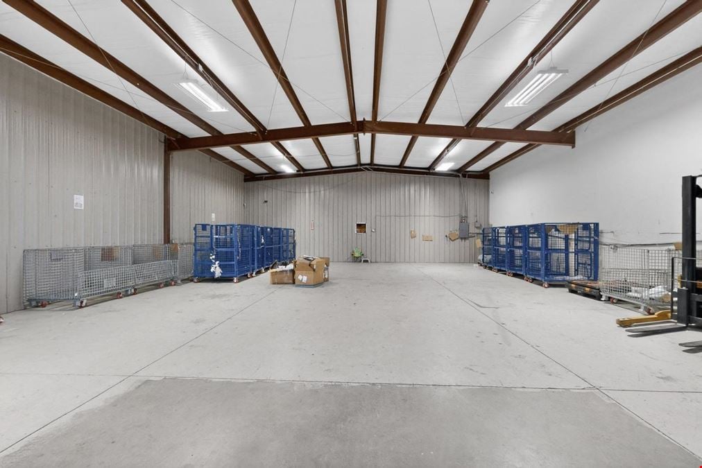 RARE WAREHOUSE WITH GATED & PAVED YARD