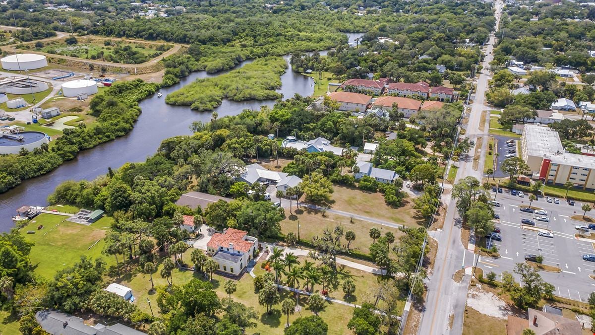 THE 2.08 ACRES OF MULTI-FAMILY LAND IMPROVED WITH SINGLE-FAMILY HOMES