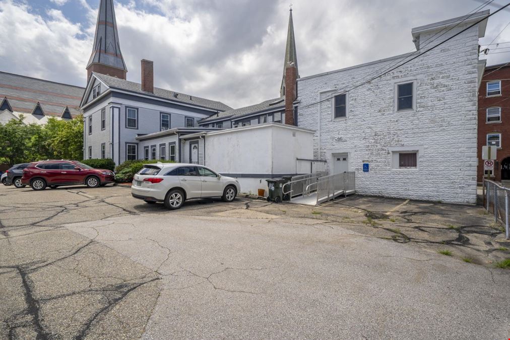 Adaptive Downtown Office Building with Large Parking Inventory