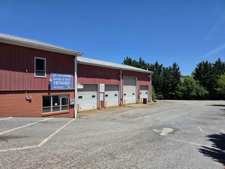 SHOWROOM - OFFICES- SERVICE BAYS -DISPLAY YARD
