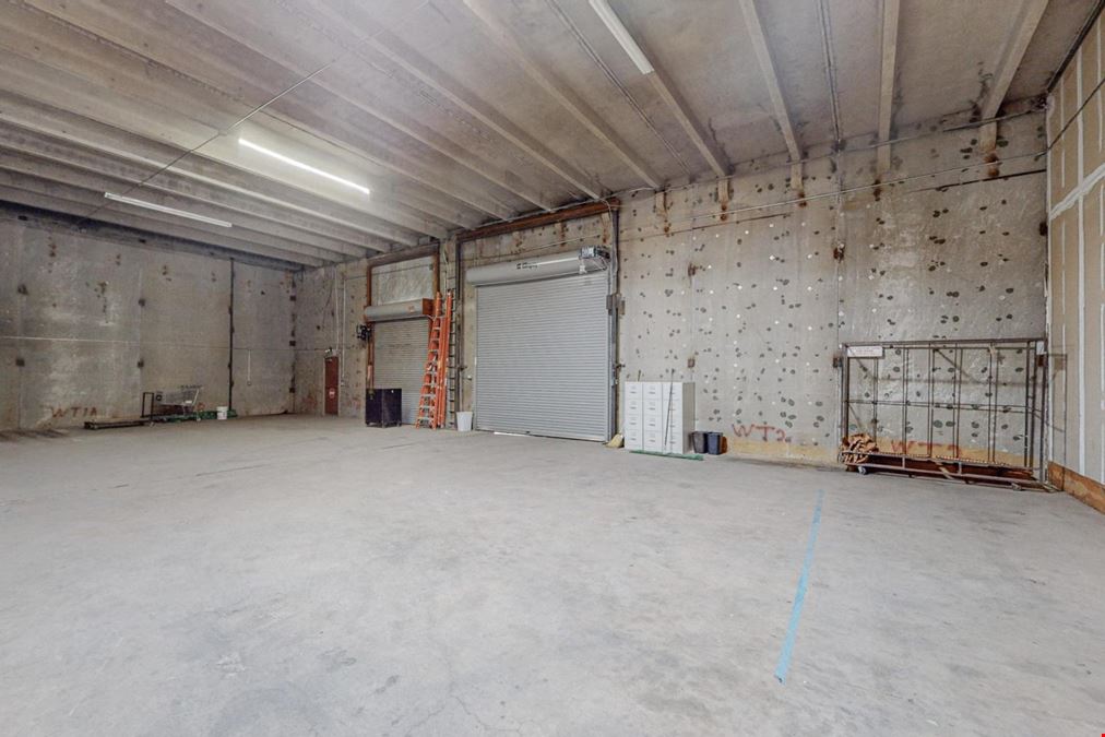 Warehouse Concrete Tilt Up With Gated & Paved Yard with Drive in Door