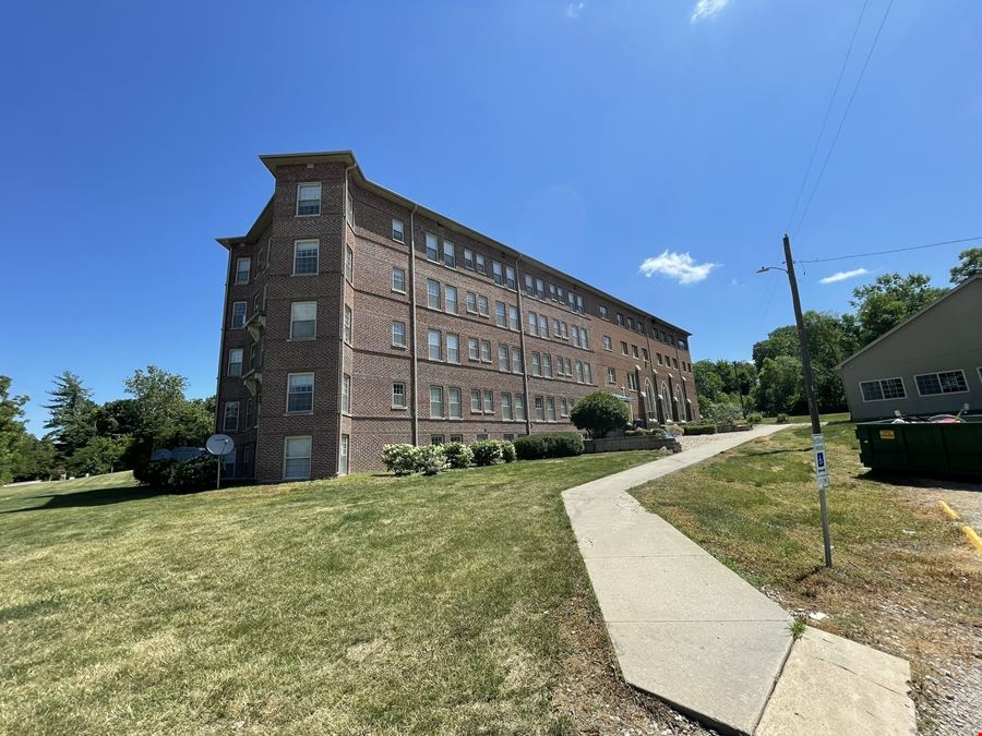 18-Unit Apartment Complex and Church