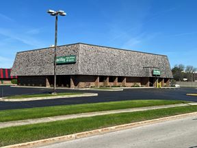 Retail Building on 1.73 Acres - Or - Redevelopment Opportunity