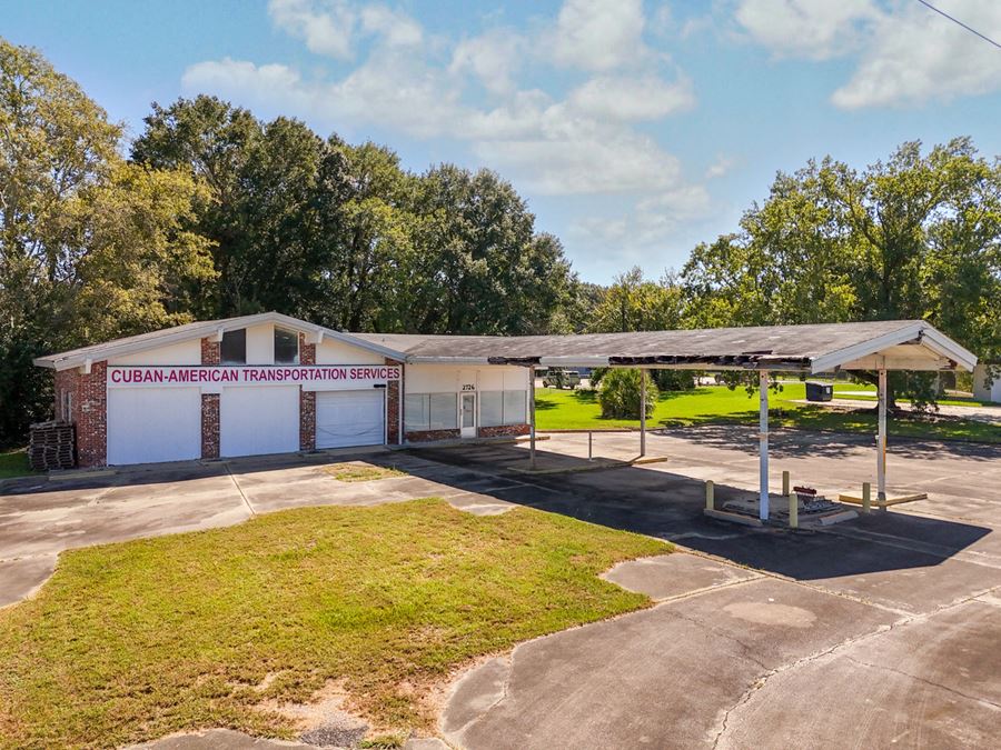 Two Commercial Buildings with Surplus Land on I-49