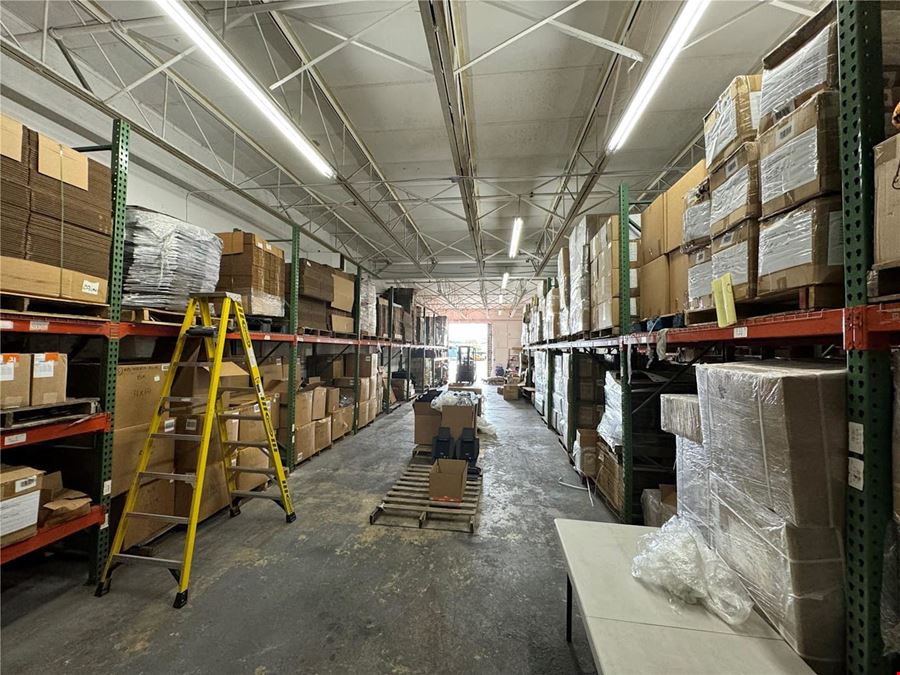 1.72 Acre Total Lot with Existing +/- 26,304 SF Multi-Tenant Warehouse