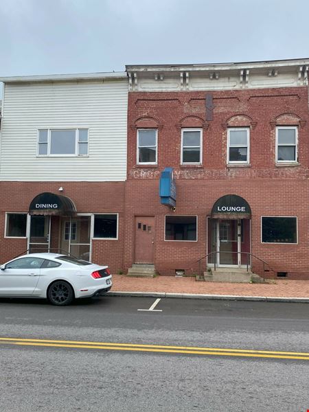 Preview of Retail space for Sale at 102 East Main St