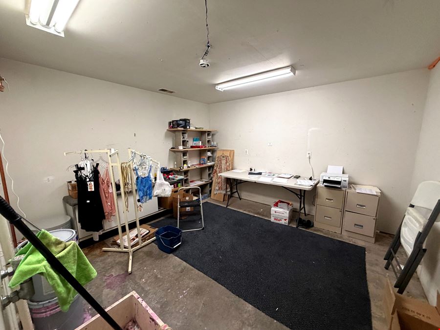 Retail Property with Open Showroom Near Hy-Vee For Sale