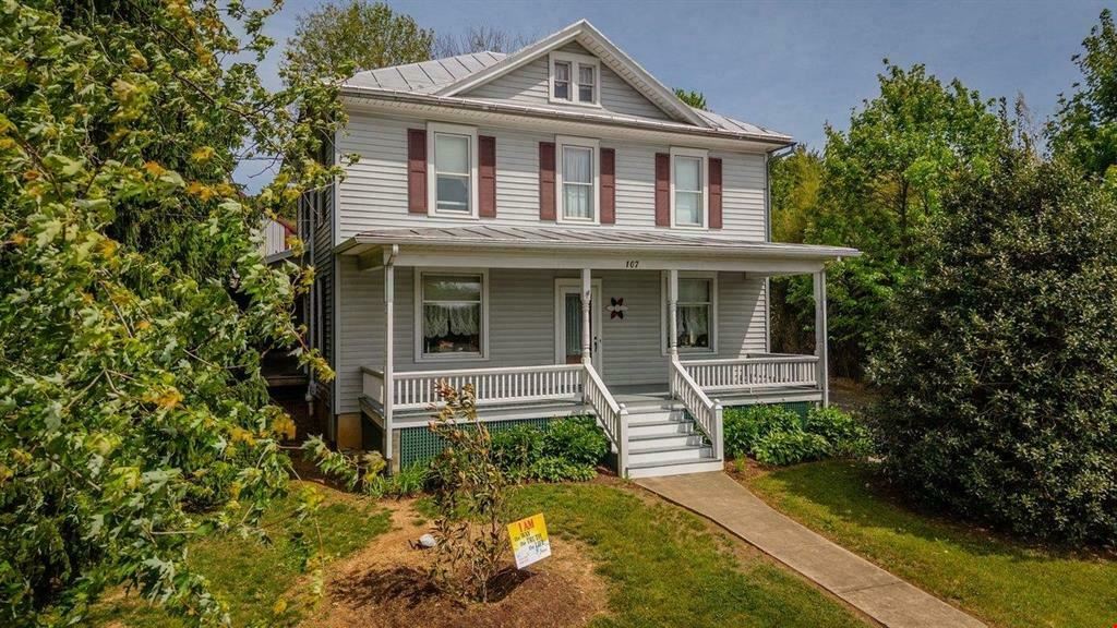 UPDATED RESIDENCE & 30X40 SHOP | ZONED BUSINESS ON 1.3 ACRES