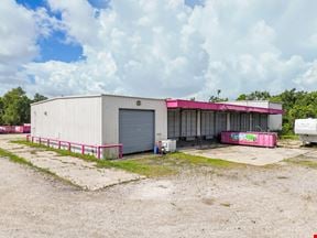 ±10,840 SF Warehouse with Yard on Corner Lot