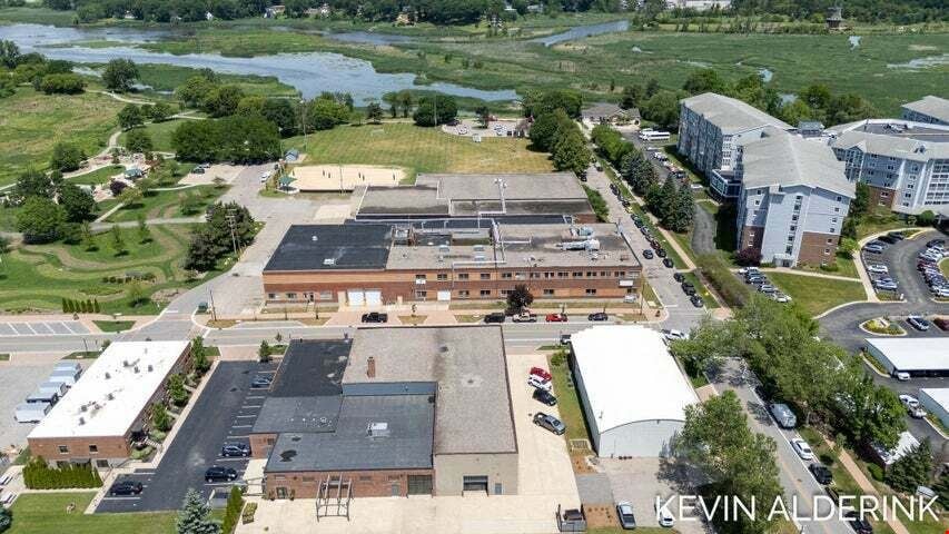 Located in the Heart of Downtown Holland Overlooking Window on the Waterfront
