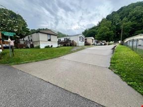 71 Saratoga St. & 11 Ticonderoga Dr.