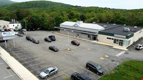 20,000 SF Former Rite Aid with Adjoining Retail/Office Space