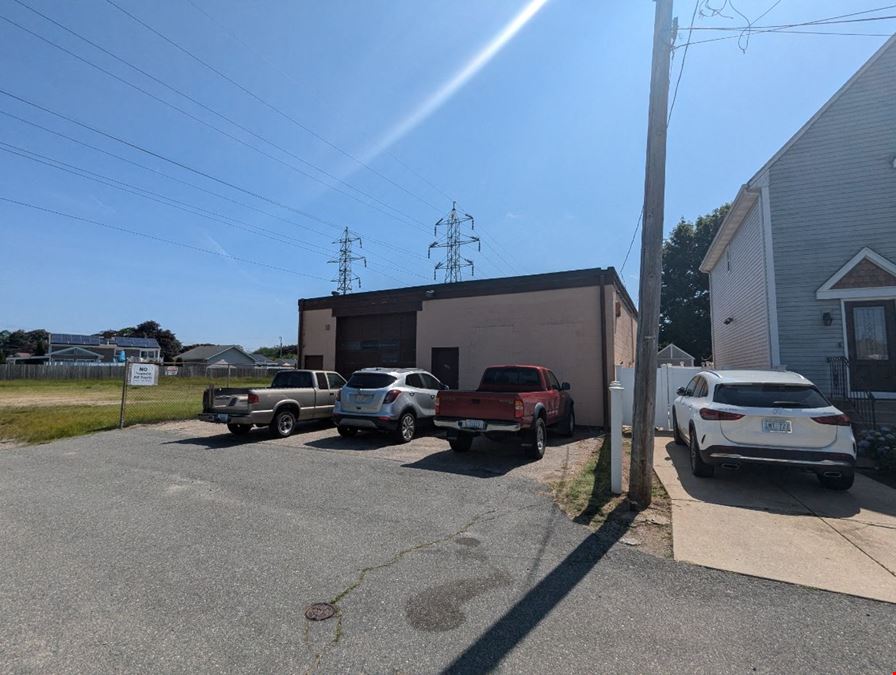 Versatile Industrial Property with Extra Lot – 21 Pommenville St, Pawtucket, RI  02861 & lot 927 Campbell St 