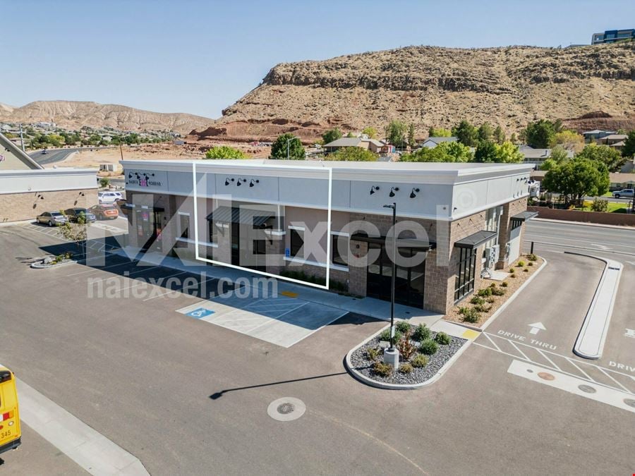 Lit Intersection Retail w Drive-thru