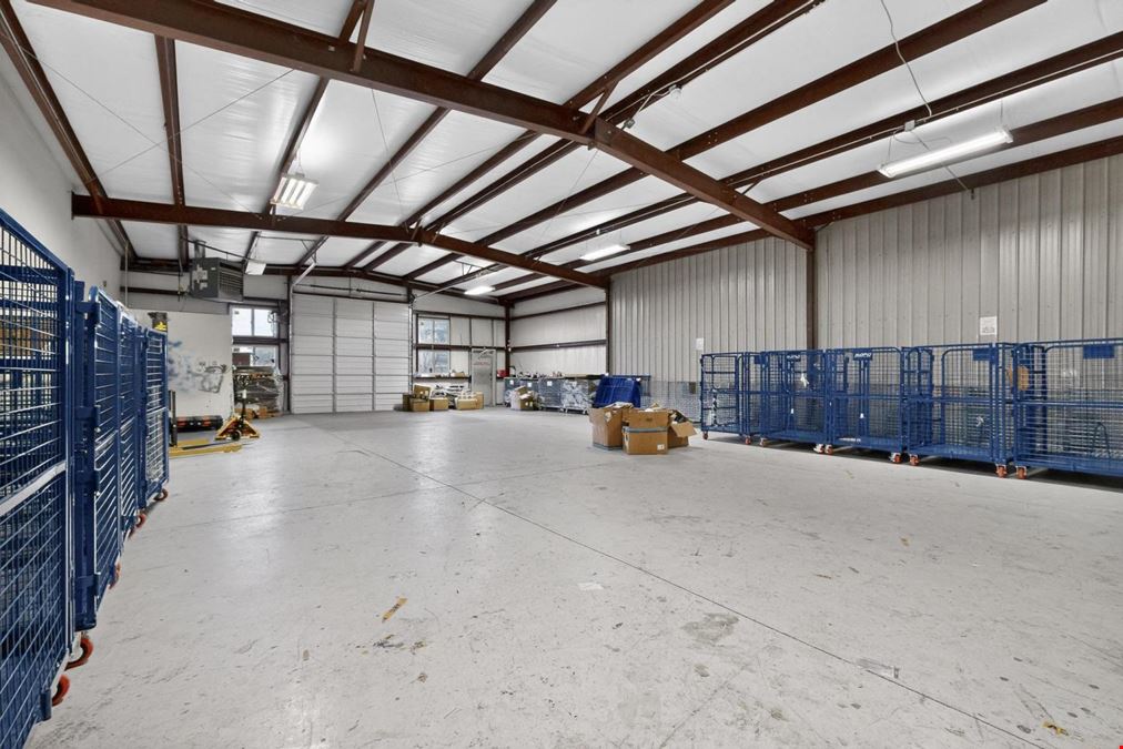 RARE WAREHOUSE WITH GATED & PAVED YARD